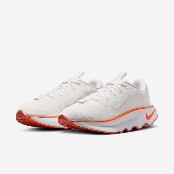 Nike Motiva side view white orange